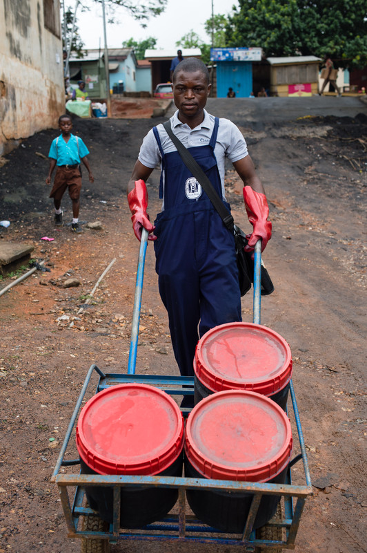 Clean Team waste collector_ Elisha_ making his morning rounds1